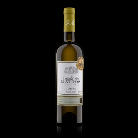Bottle of Quinta dos Mattos white wine from Douro region with gold foil cap against black background
