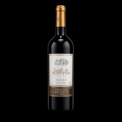 Bottle of Quinta dos Mattos Grande Reserva Douro red wine with gold foil top and cream-colored label on black background
