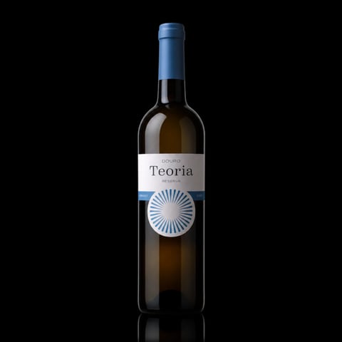 Bottle of Teoria white wine with blue cap and circular sun logo on label against black background