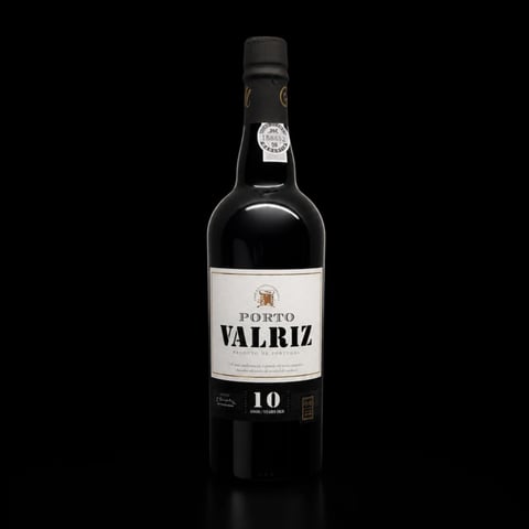 Bottle of Porto Valriz 10 year aged tawny port wine on black background